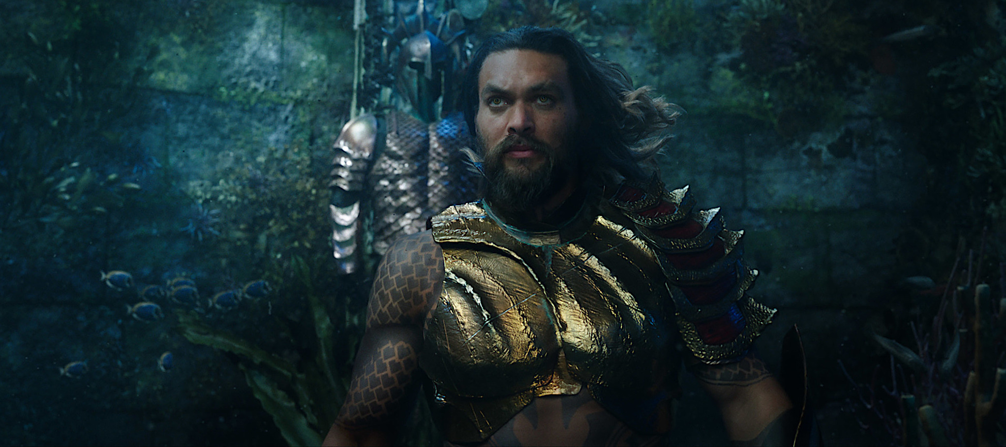Jason Momoa in the live-action Aquaman, underwater and in armor
